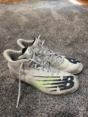 Used New Balance Rush Cleats Size 13