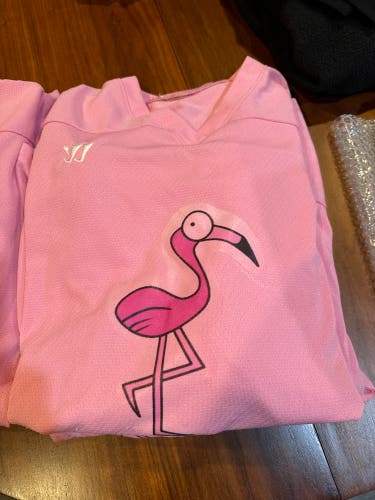 Pink Used Small Warrior Jersey’s
