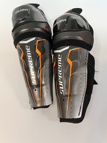 Used Junior Bauer supreme one.4 12" Shin Pads