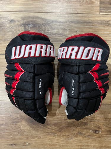 Chicago Blackhawks Used Warrior Alpha DX Pro Gloves 14" Pro Stock