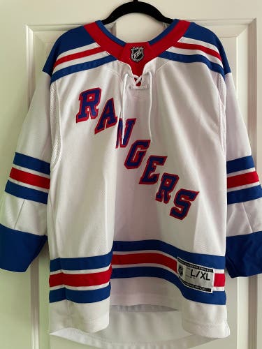 Clean White Artemi Panarin Used Youth L/XL Rangers Jersey.
