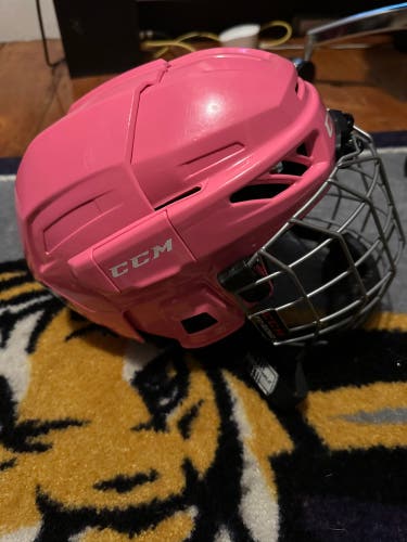 Pink, adjustable CCM Fitlite 3DS Youth Hockey Helmet