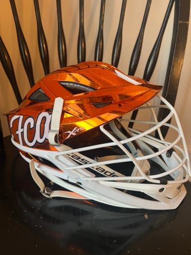 Orange Lacrosse helmet