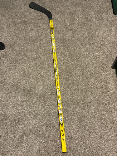 Yellow Easton synergy hockey stick