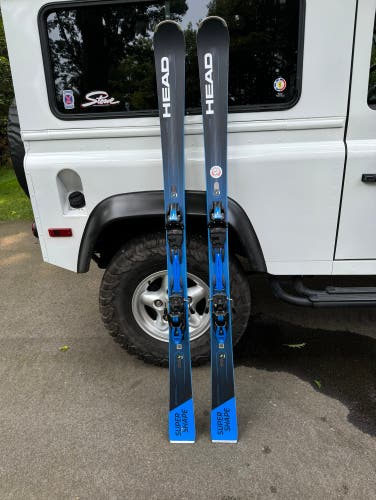 Like New HEAD e-Titan Super shape Skis With Bindings