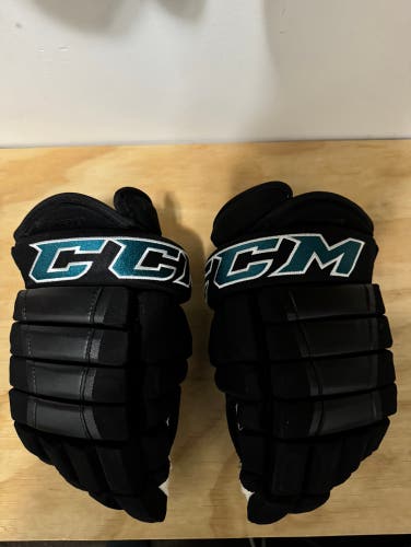 Used ccm hg97 gloves black size 14
