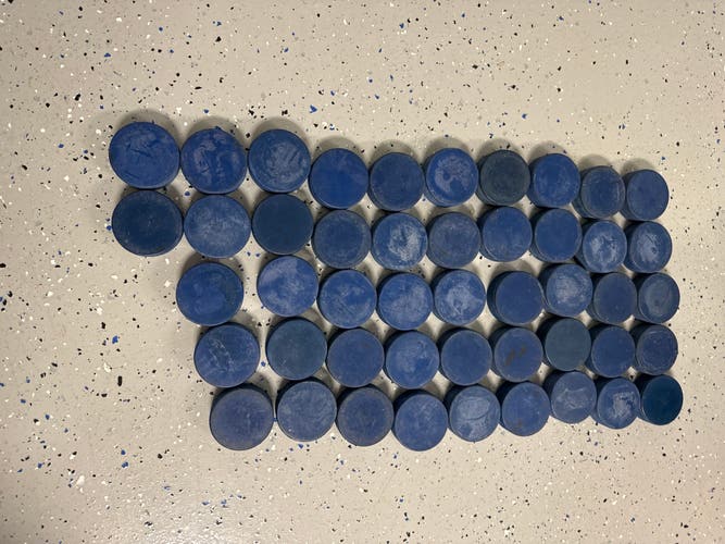 Blue Hockey Pucks