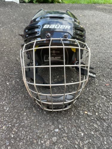Used Medium Bauer Re-Akt 75 Helmet with Bauer profile III cage