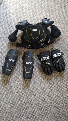 Used Medium Youth STX Stallion 200 Shoulder Pads, gloves, and arm pads