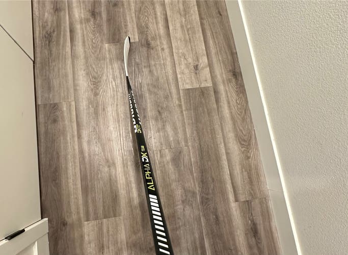 Used Intermediate Warrior Left Hand W28  Alpha dx team Hockey Stick