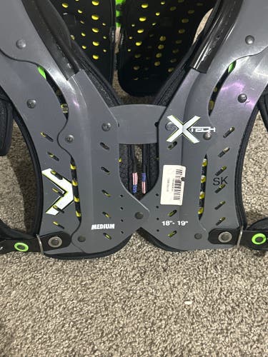 X tech adult Meduim pads and Rib protector