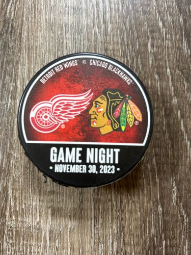 GAME NIGHT PUCK DETROIT RED WINGS VS CHICAGO BLACKHAWKS 11/30/2023