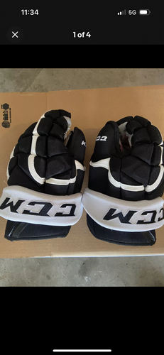 Used CCM HG12 Gloves 13" Pro Stock Malkin penguins