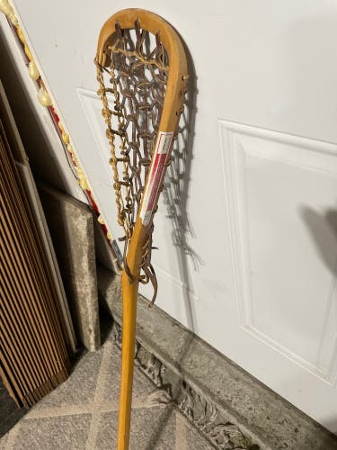 Mowhawk traditional wooden lacrosse stick