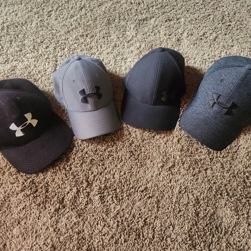 Under Armour Hats 3 Large/Extra Large, 1 Adjustable. Nice hats