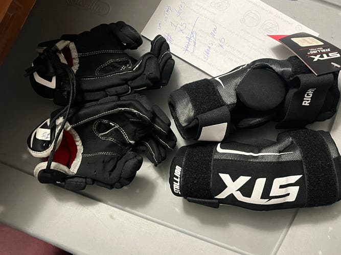 Xs lacrosse gloves and elbow pads