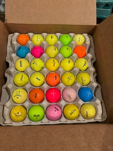 5 dozen assorted colored golf balls *used*