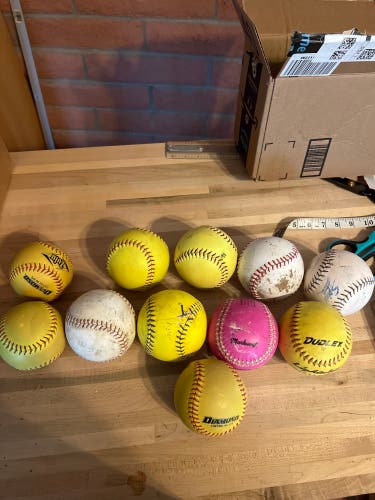 11 Used Softballs