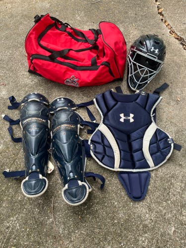 Used Blue Youth Under Armour Catcher's Set Age 9-12 Helmet 6 1/4-7 with red bag