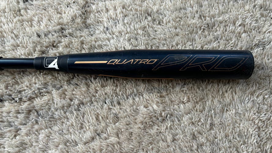 Used 2022 Rawlings Quatro Pro Bat (-11) Alloy 16.5 oz 27"