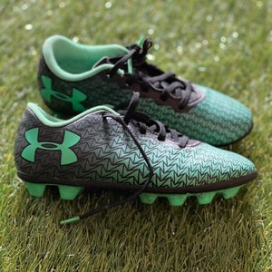 Used - Black/Green Under Armour youth soccer cleats