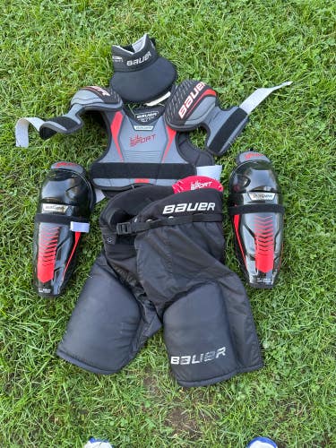 Used Junior Bauer Starter Kit (shoulder pads, pants, shin pads)