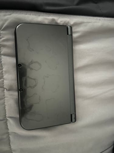 Nintendo 3DS XL SE with charger