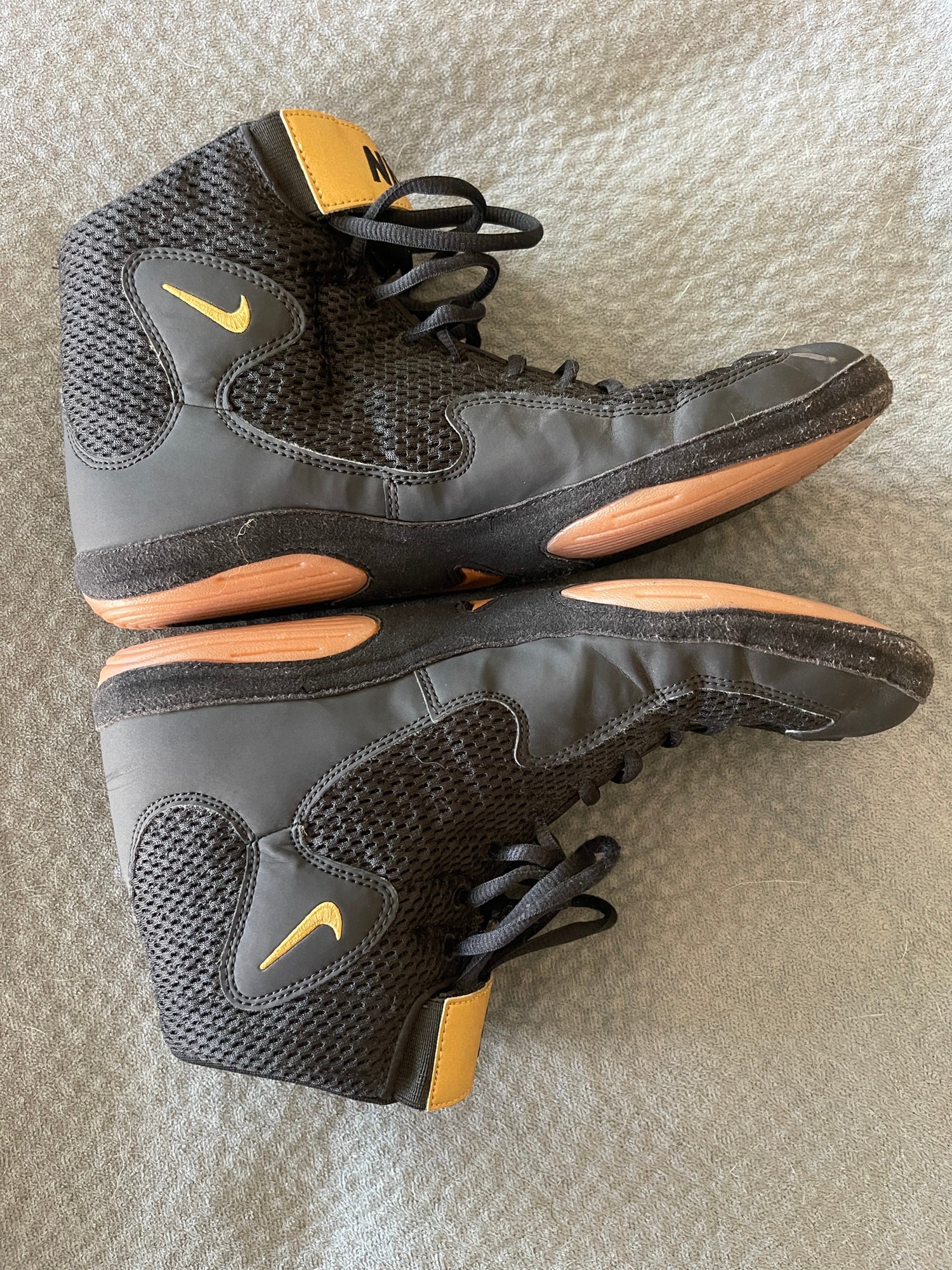 black and gold nike inflict wrestling shoes