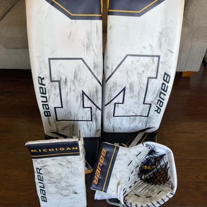 NCAA Michigan Pro Stock Bauer Goalie Pads, Glove, and Blocker - Size large