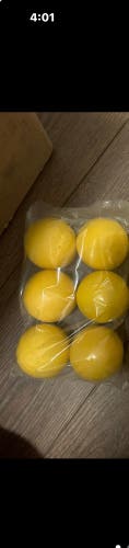 New lacrosse balls . Set of 6 yellow