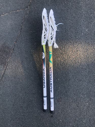 2 - Wolf World Mini Lacrosse Sticks - Australia and Uganda