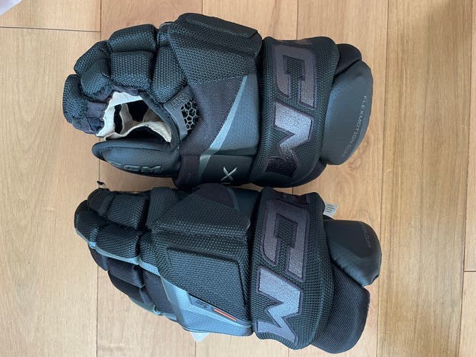Extremely Lightly Used CCM Tacks XF Pro Gloves 14"