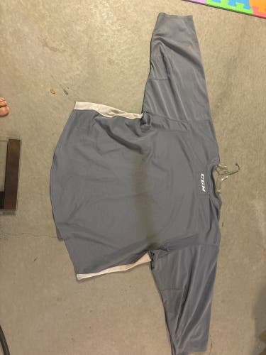 Grey CCM goalie cut jersey