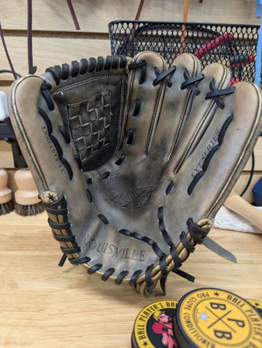 Used Right Hand Throw Louisville Slugger Pitcher's LXT Softball Glove 12"