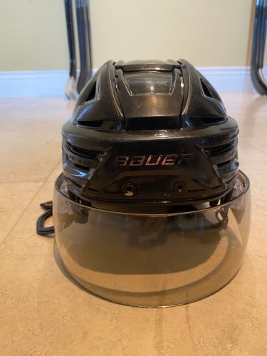 Used Medium Bauer Re-Akt 150 Helmet