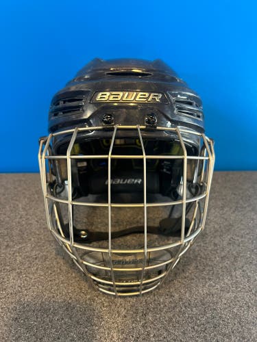 Used Medium Bauer  Re-Akt 100 Helmet