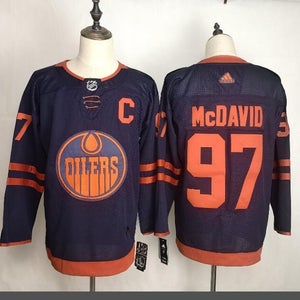 Connor Mcdavid jerseys size 50 alternate navy blue one with orange lettering