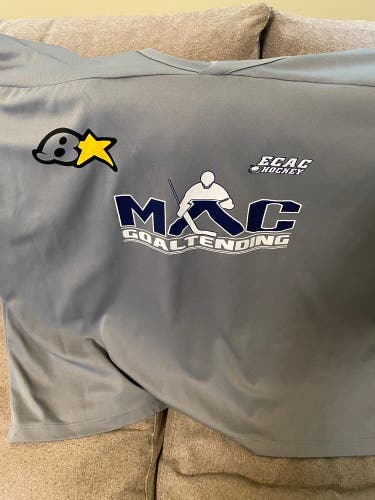 Brian’s goalie jersey, XXL.