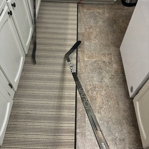 Bauer Right Handed Vapor ADV Hockey Stick Dressed As A Silver Hyperlite