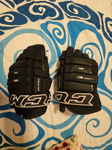 Used CCM HG 4R Pro Gloves 13"