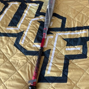 New In Wrapper Rawlings Quatro Max 32/29