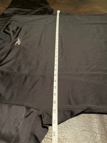Size 54 Reebok Hockey Jersey. Black.