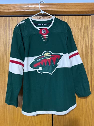 Used authentic Minnesota Wild home green jersey size 50