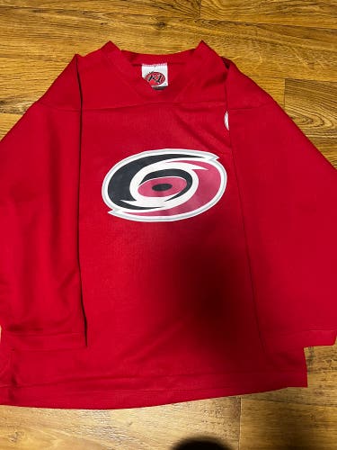 Carolina hurricanes youth Medium practice jersey