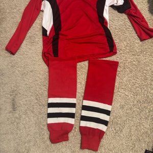 Red Men's Small Hockey Practice Jersey With Matching Socks.