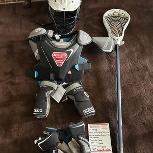 Lacrosse equipment. Full set up. Meets NOCSAE . Size small/medium