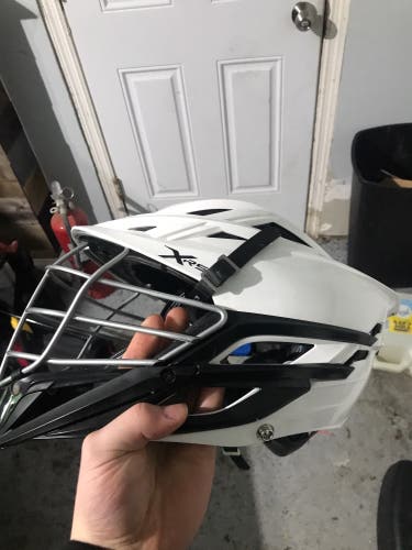 White XRS pro lacrosse helmet