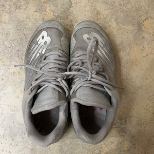 Men’s New Balance grey size 6 baseball turf shoes used