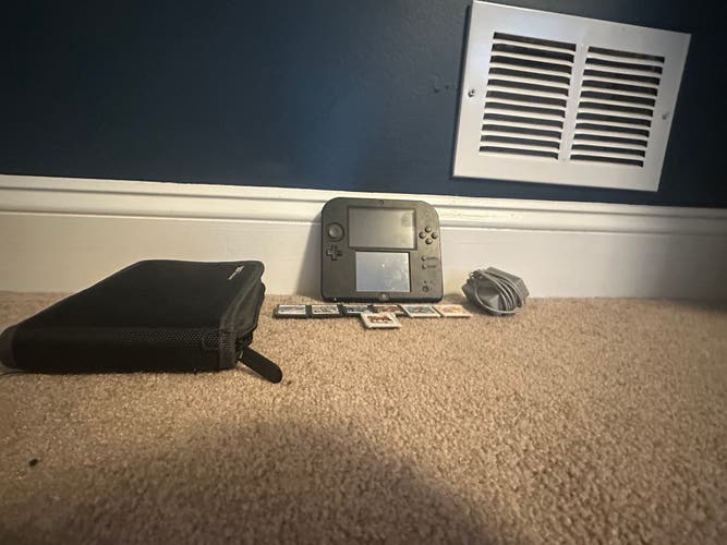2DS with games and case