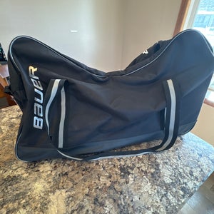 New Black Bauer S21 Junior Wheeled Roller Bag